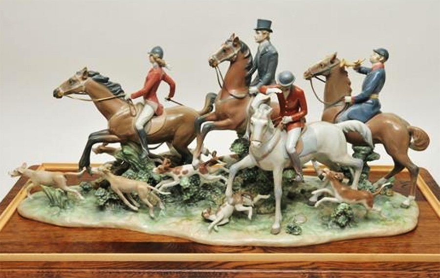 The Fox Hunt Lladro figurine featured a collection of four mounted hunters surrounded by hounds